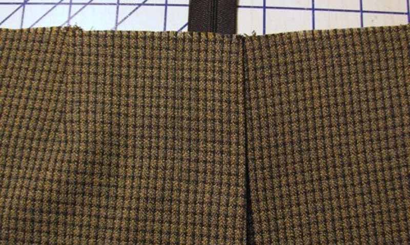 Plus long que nécessaire sur une fermeture éclair de type fly-front